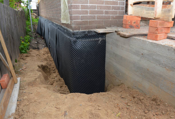 Happy homeowners after waterproofing job in Terrace Park